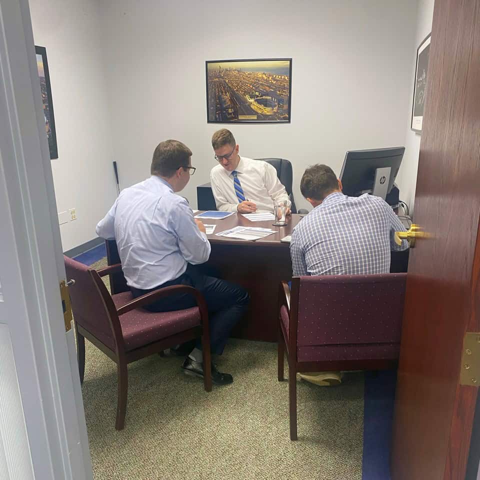 A Tranel advisor meeting with clients